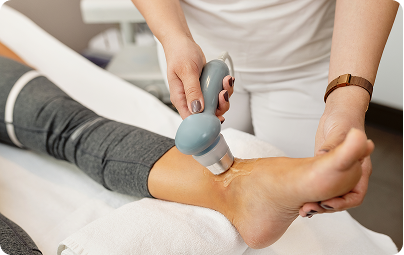 Shockwave therapy applied to a patient's heel